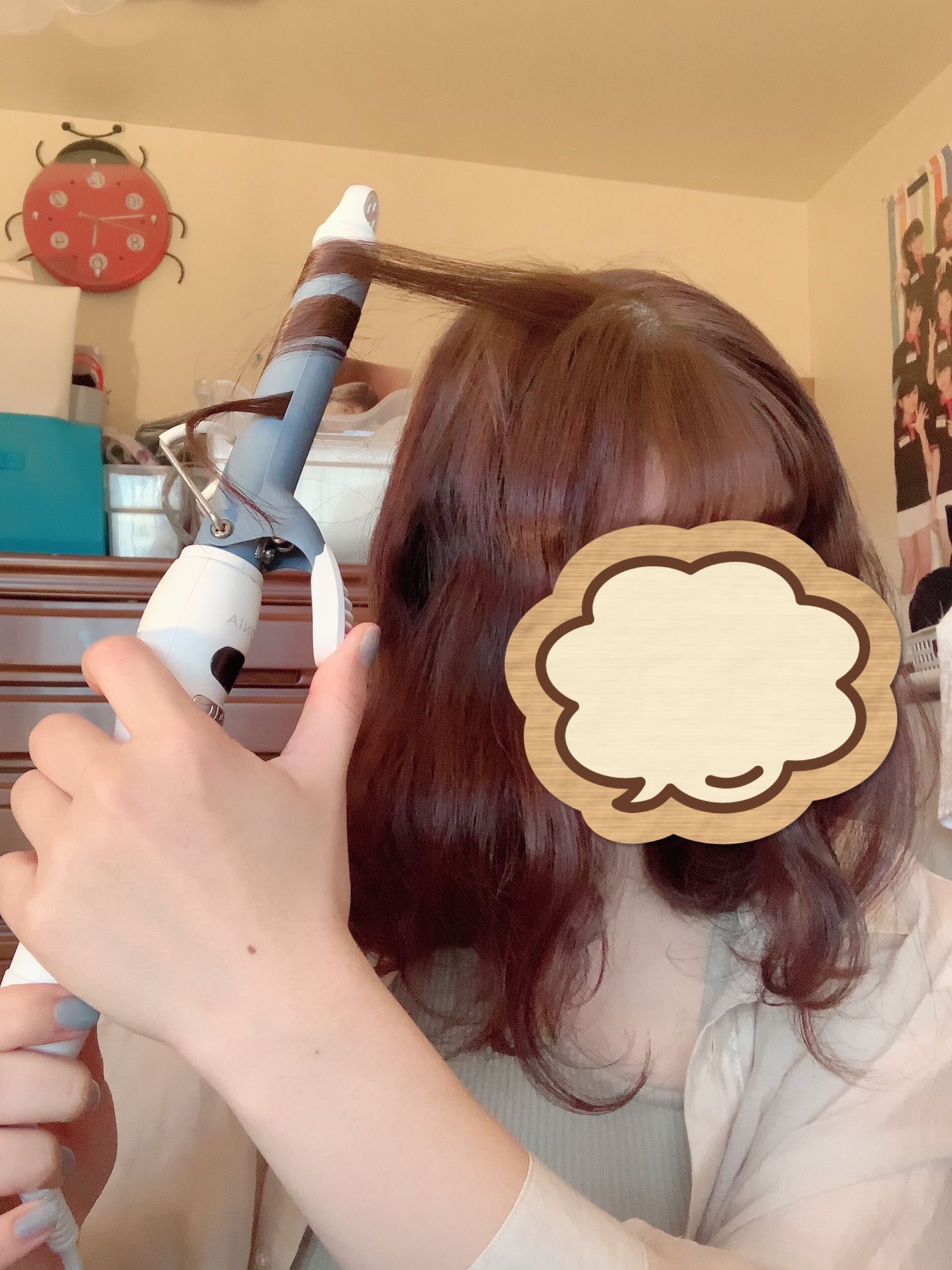 上の方の毛束をとって巻く